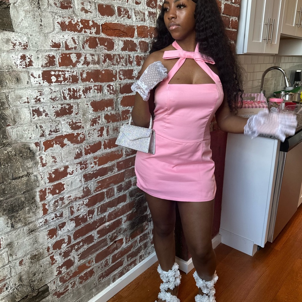 Pink halter neck with bow detail romper
